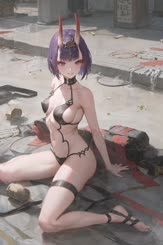 a sexy girl sitting on the ground in a bikini 
