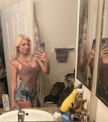 Blonde Babe Takes Selfie in Bathroom Mirror