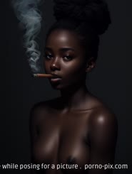 a beautiful young lady smoking a cigarette while posing for a picture . 