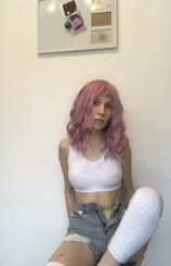 Pink wig selfie with wall behind you!