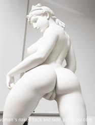 a statue of a woman 's naked back and side 
