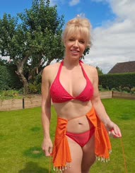 Sunny Day in the Garden: A Blonde Babe in a Bikini