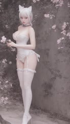a woman in white lingerie and stockings