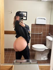 Pregnant Woman Takes Selfie in Bathroom: Baby Due Soon!
