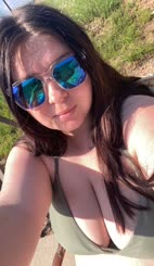 Sunglasses selfie with huge breasts   a picture that's both cute and naughty!
