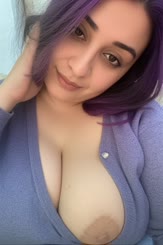 a woman with a big tits and a pimple on her face