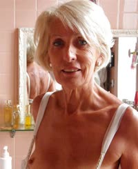 Naked in the Bathroom: A Mature Woman's Confident Striptease