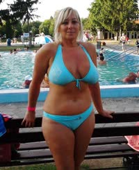 Busty Blonde Babe at the Swimming Pool