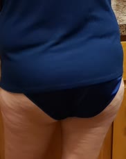 Good morning boys, I thought I would wear my dark blue satin panties today. There getting a little damp between my legs though. Still leaking cum from all the loads I took yesterday.