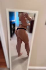 Mirror selfie of a fat woman in panties showing butt and legs
