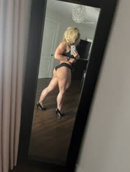 Sultry Selfie: A Blonde Bombshell in Lingerie