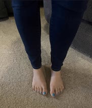 Jeans are tight, toes are bright