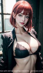 a beautiful woman with red hair wearing a black bra . 